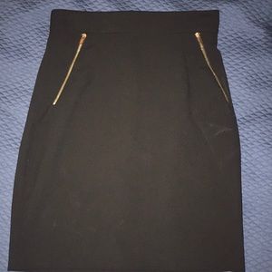 Cute black pencil skirt w/ gold zipper detailing.